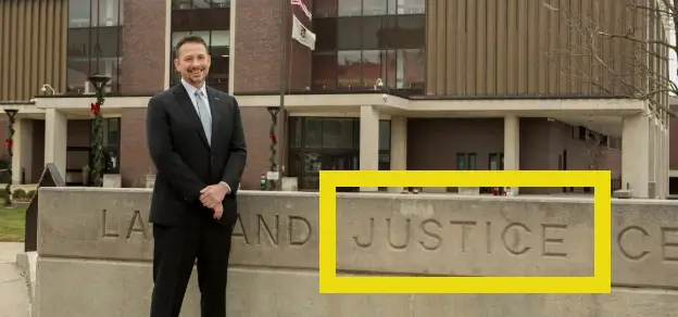 Personal injury lawyer Terry Dodds in front of building