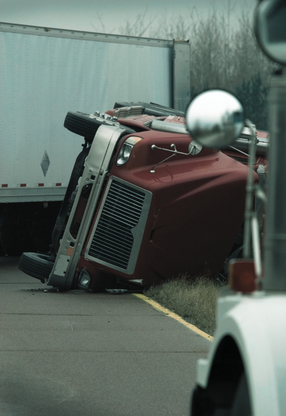 overturned semi truck in an accident on the highway