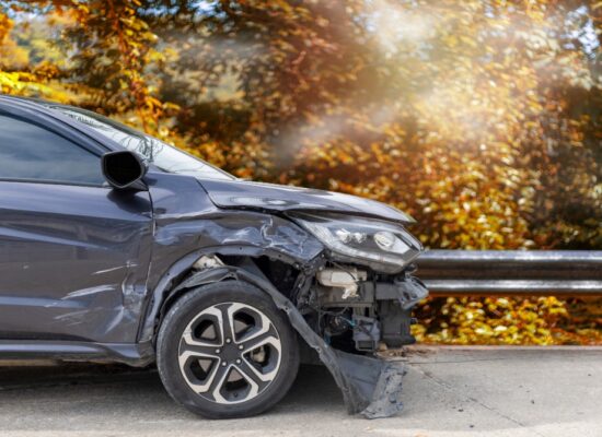 Bloomington car accident attorney Terry Dodds portrayed by damaged car.